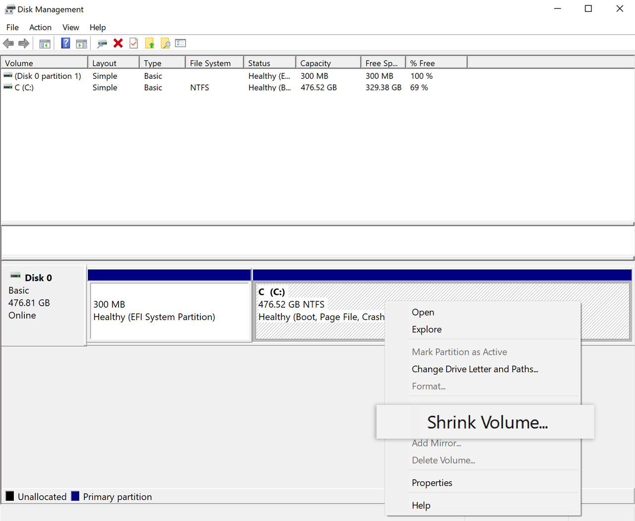 Administració de discos de Windows amb l’opció Redueix el volum assenyalada.
